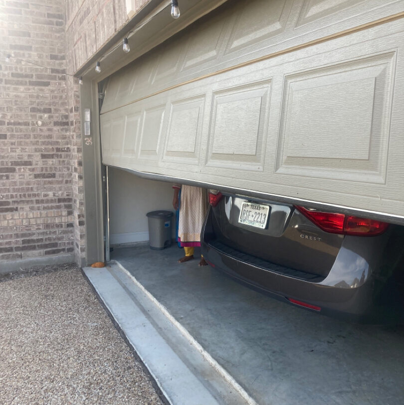 garage door bent track