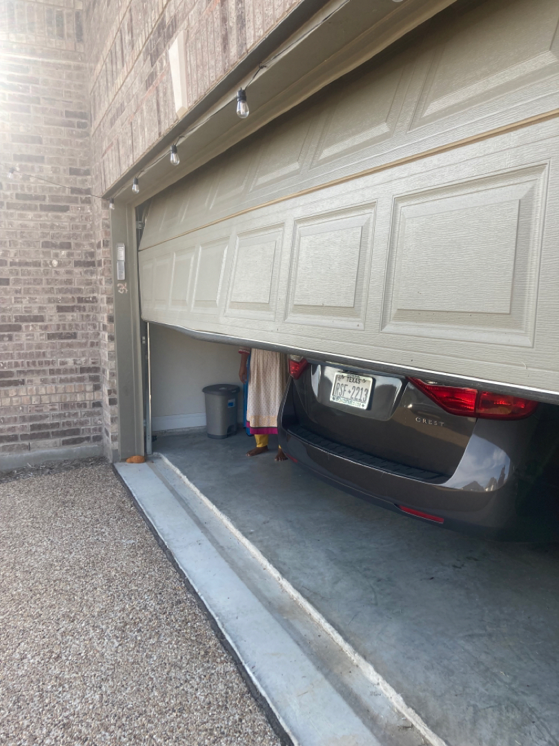 garage door bent track