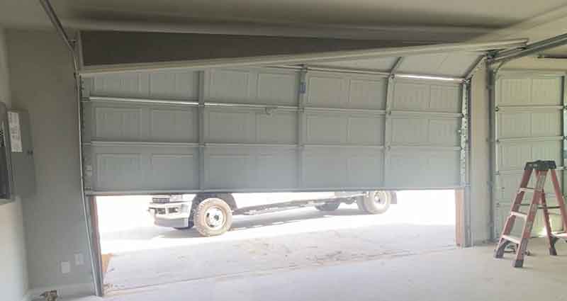 steel-garage-door-off-track