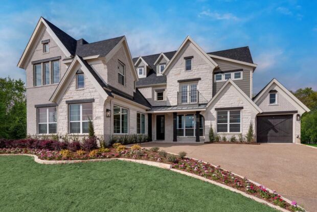 texas stone home with stained garage door