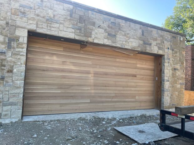 20x9 white oak plank garage door built by doorvana and installed in Dallas, Texas