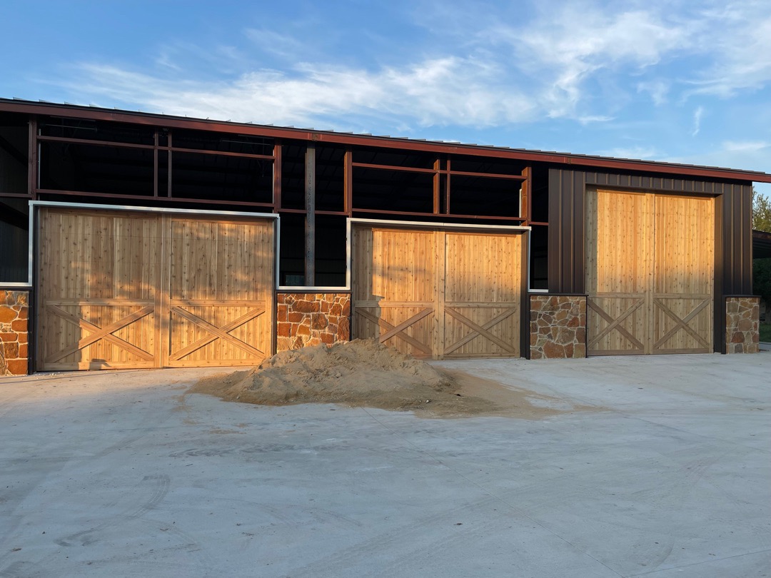 14x14 and 14x10 cedar garage doors for a metal building in aledo, texas