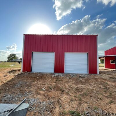 two amarr 2412 9x8 sectional overhead light duty commercial garage doors installed by doorvana in rhome texas