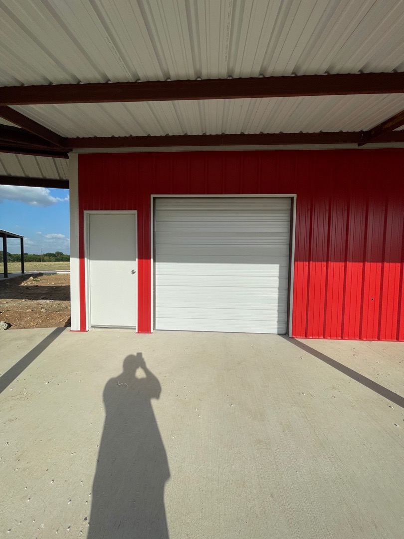 8x8 steel shop garage door installed in rhome texas by doorvana garage doors