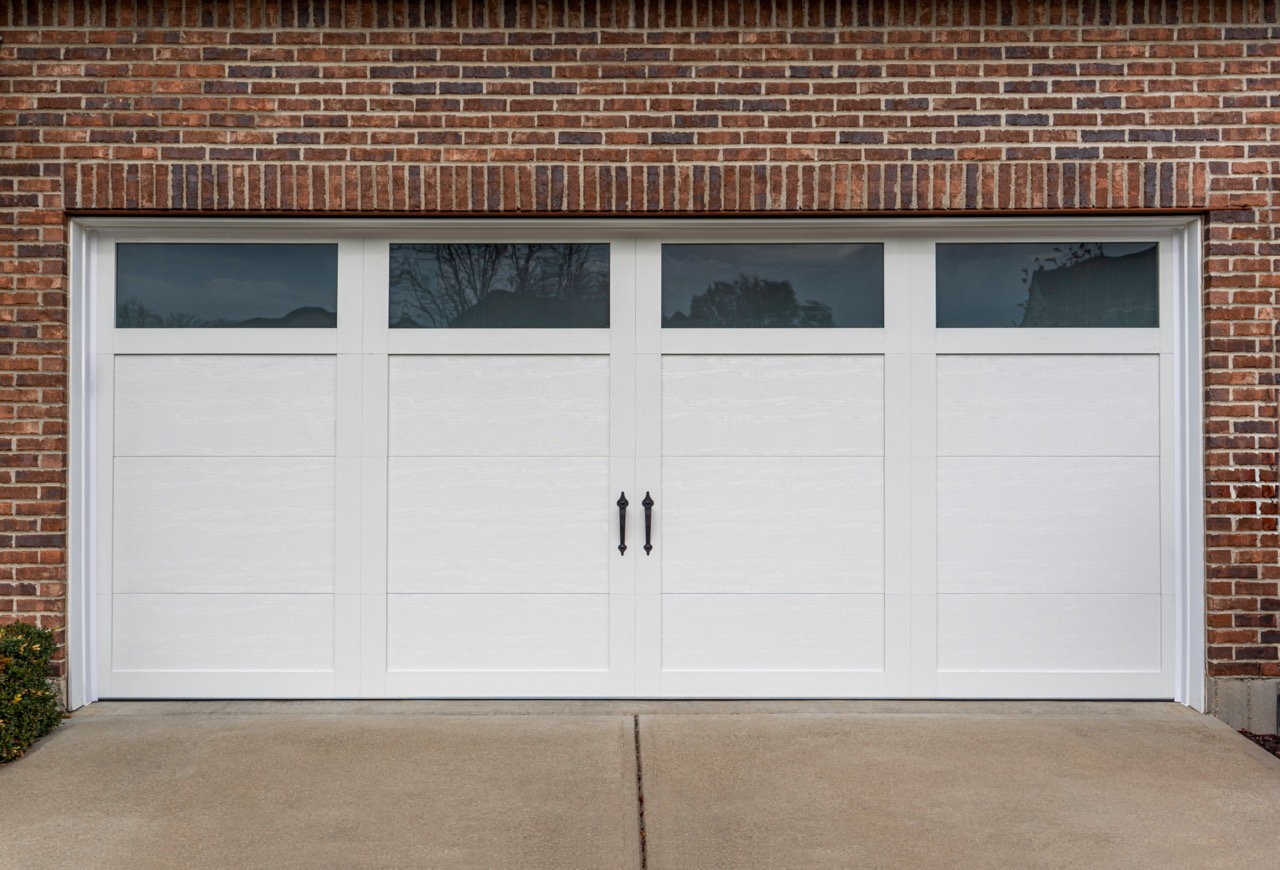clopay canyon ridge elements white garage door with a glass top section available from doorvana garage doors
