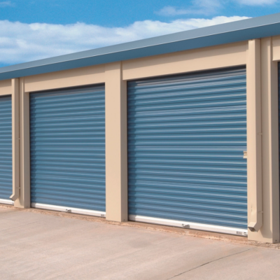 A row of blue self-storage units with Clopay Rolling Sheet Doors