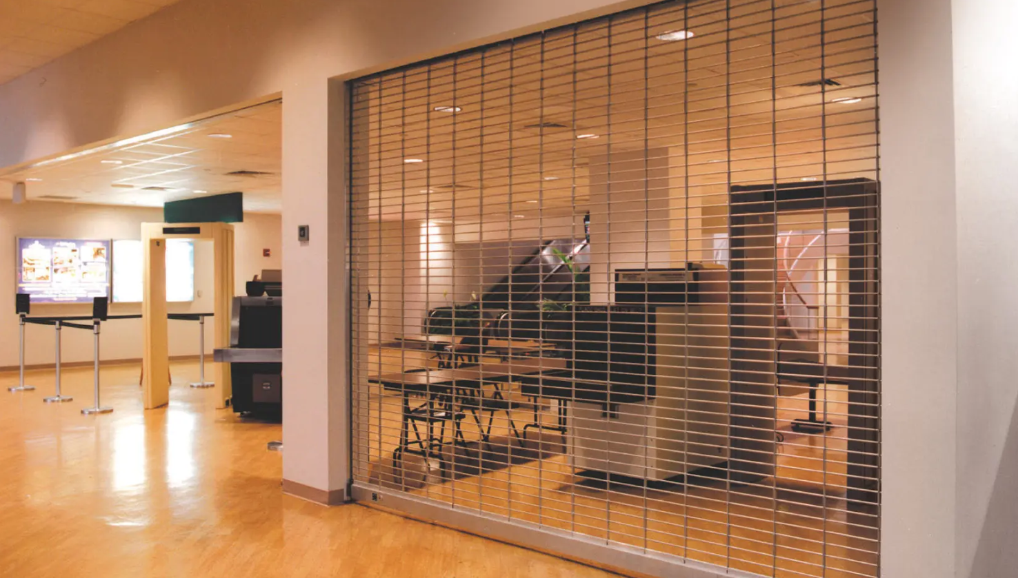 Metal Clopay Security Grille Doors off a hallway