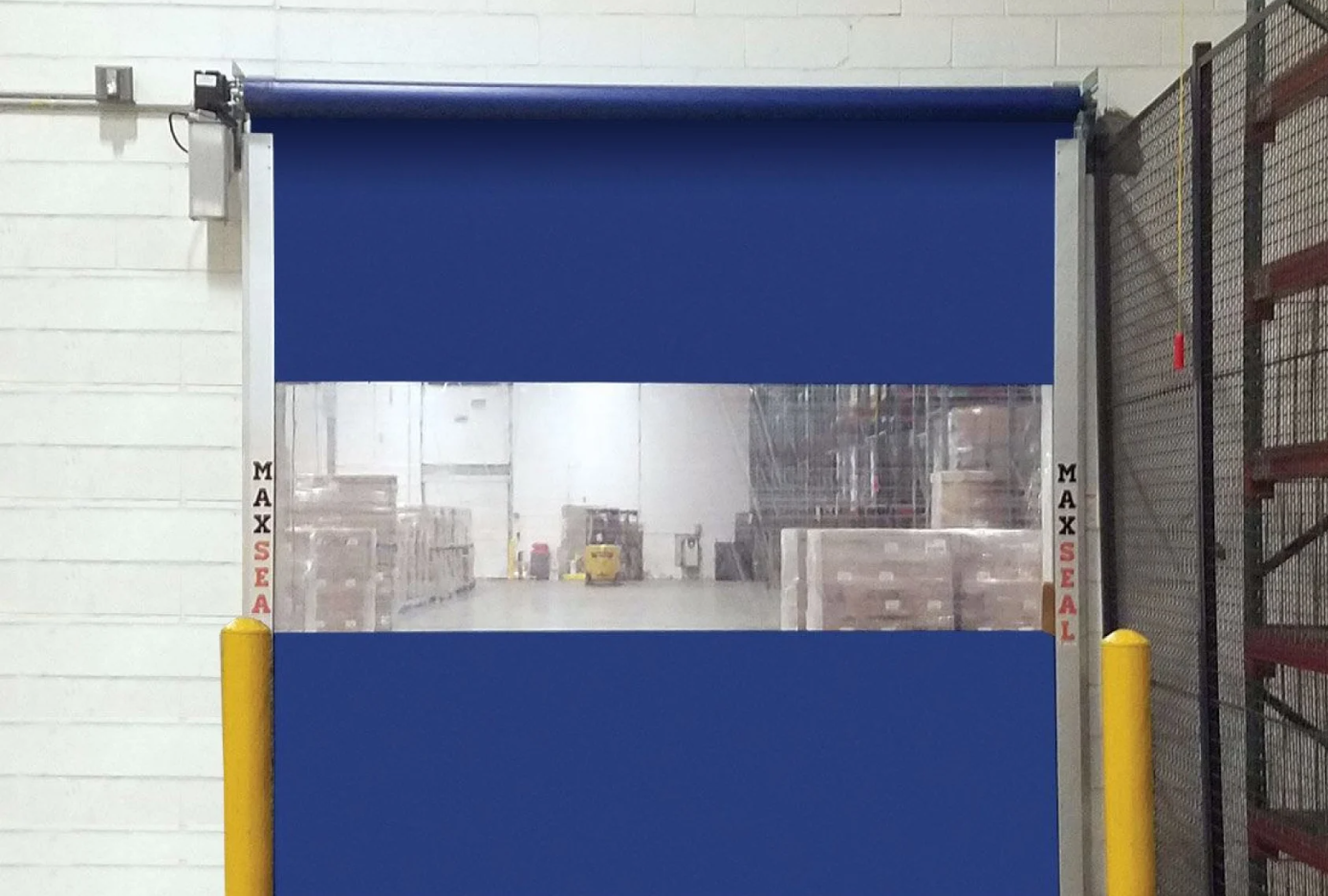 A blue high-speed roll-up door with a transparent window showing a warehouse interior.