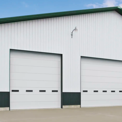 White industrial overhead Clopay Industrial Series doors on a building