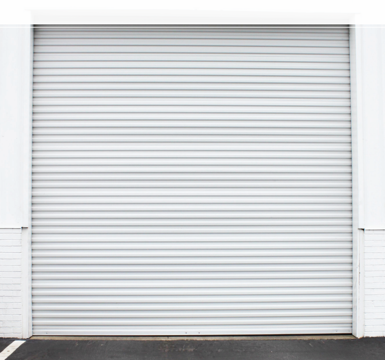 A closed white commercial Janus Series 3100 Commercial Sheet Door.