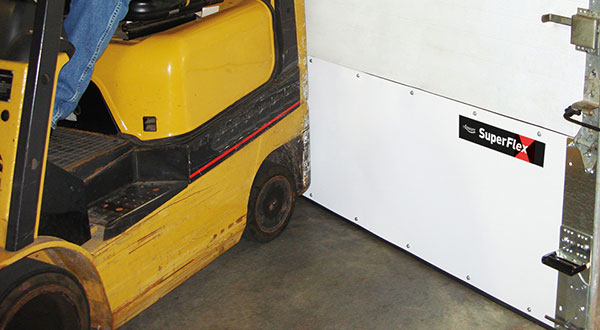 A yellow forklift next to an Amarr Superflex white industrial impact door