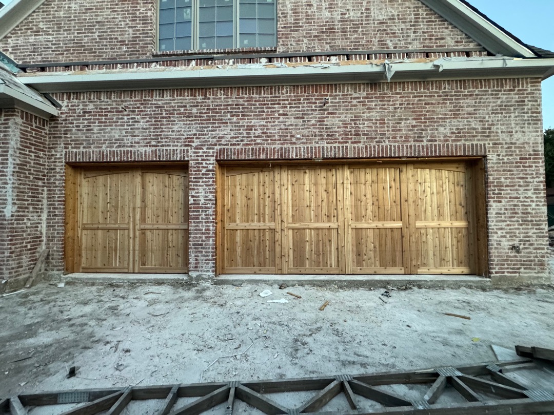 18x8 and 9x8 real cedar carriage style garage doors with eyebrow trim